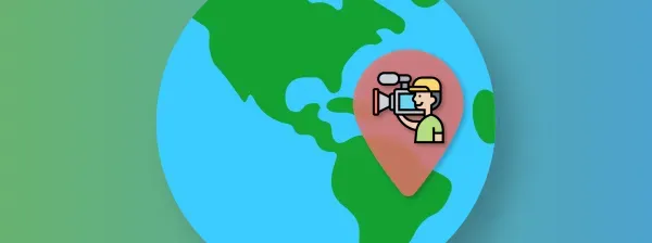 videographer on a location icon hovering above a globe